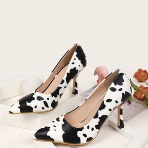 New, never worn cow print pumps/high heels.